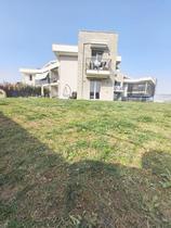 Quadrilocale con giardino in Vendita